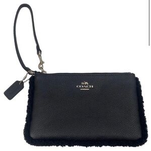 Coach shearling corner zip edge wristlet black,never used before!